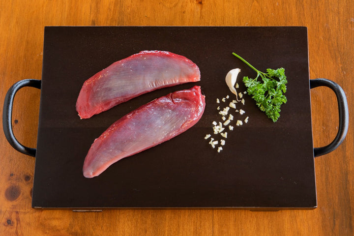 raw small portion cuts of ostrich strips