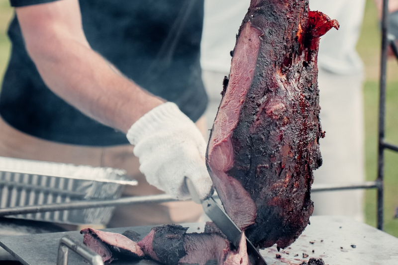 whole ostrich leg cooked and getting sliced courtesy of Central Valley Sauce Works